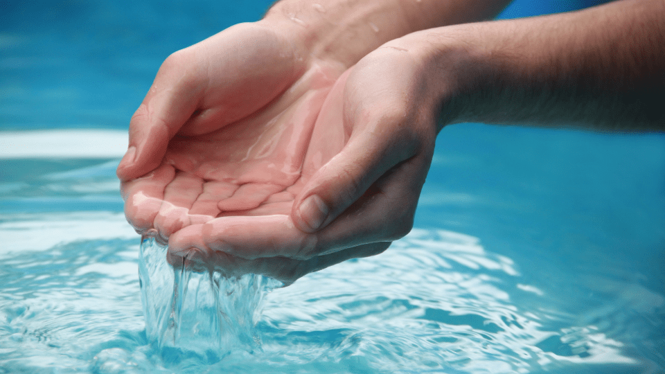 washing hand in clean water